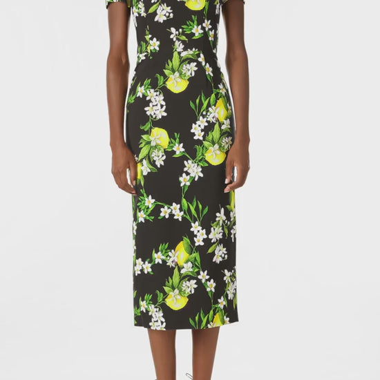 Monique Lhuillier Spring 2025 Short sleeve, corseted sheath dress in Noir and Lemon printed crepe - video.