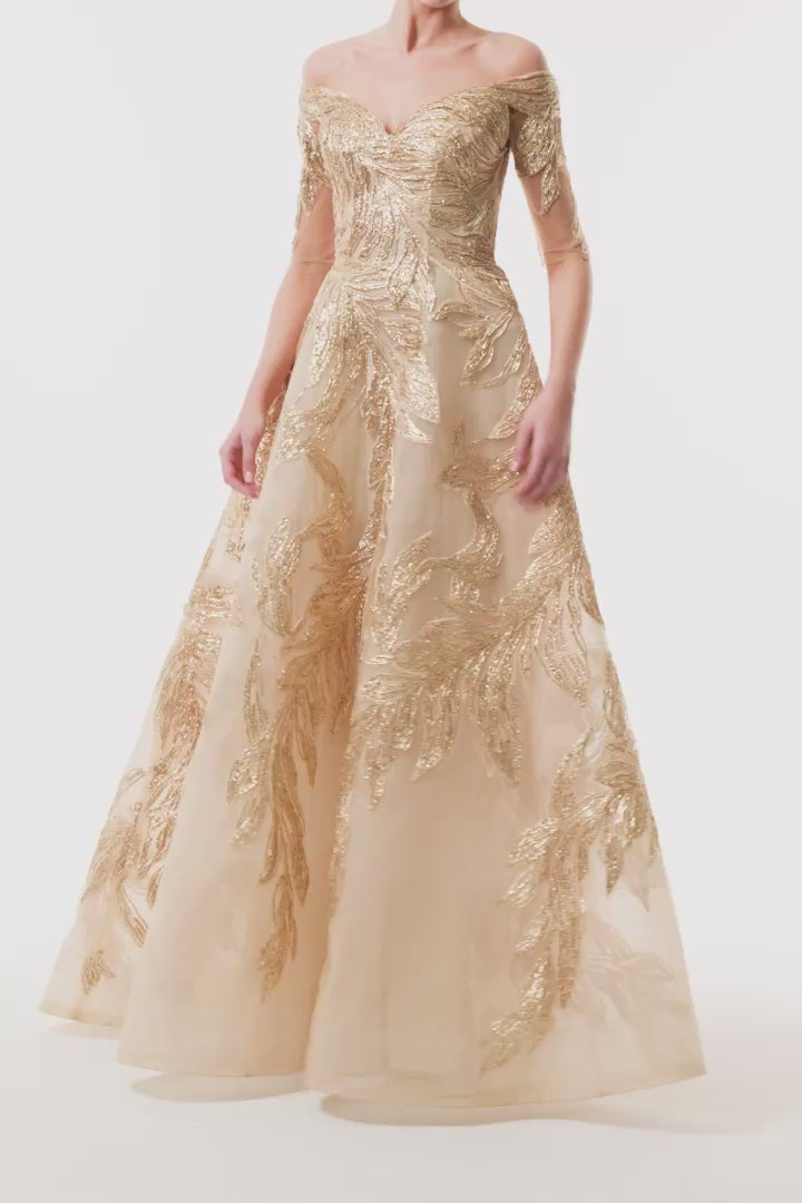 Monique Lhuillier Fall 2025 Gold feather embroidered tulle Off-the-shoulder short sleeve ball gown - video. 