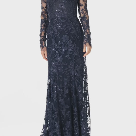 Monique Lhuillier Spring 2025 Off the shoulder, long sleeve trumpet gown with sweetheart neckline in Lapis/Noir re-embroidered tulle - video.