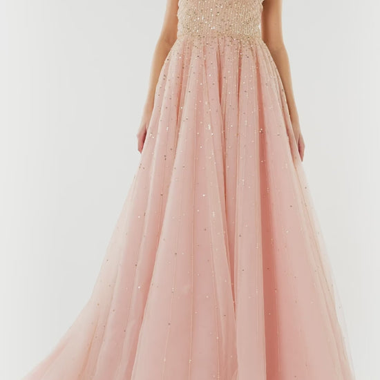 Monique Lhuillier strapless ballgown in rose colored tulle and gold embroidery.