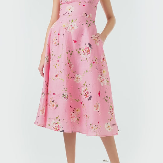 Monique Lhuillier Spring 2024 pink floral print linen cocktail dress with sweetheart neckline, flared skirt and pockets - video.