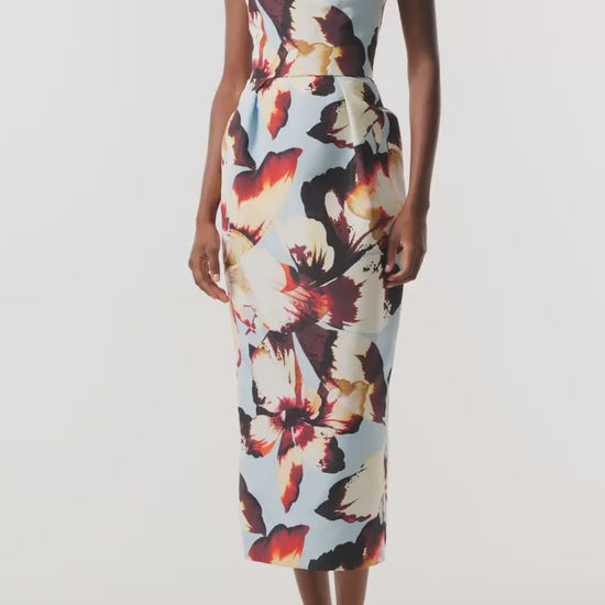 Monique Lhuillier Fall 2026 Pale Blue Amber Lily Printed Faille strapless pleated cocktail dress with pockets - video.