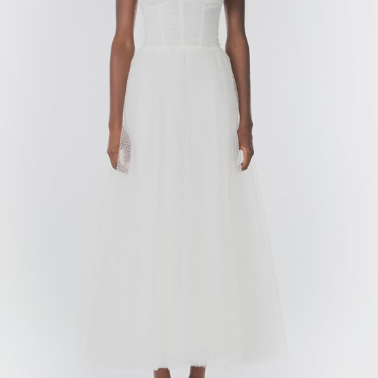 Monique Lhuillier "Brie Dress". 
 Strapless, tea length dress with sweetheart neckline in French Dot Tulle - video.