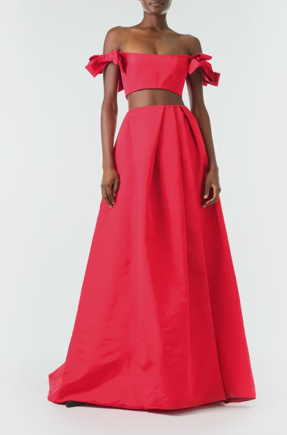 Monique Lhuillier Fall 2024 scarlet faille, off the shoulder, cropped bandeau top with bow sleeves - video.