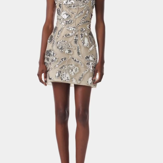 Monique Lhuillier strapless cocktail dress with structural skirt and silver metallic embroidery.