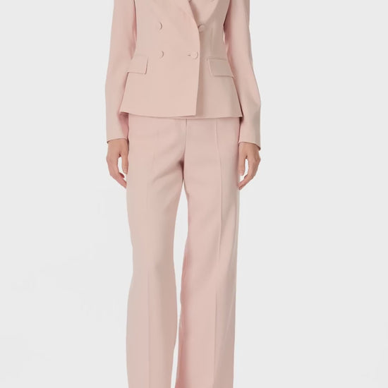 Monique Lhuillier Fall 2024 pale blush wool, double breasted wool blazer with full length sleeve - video.