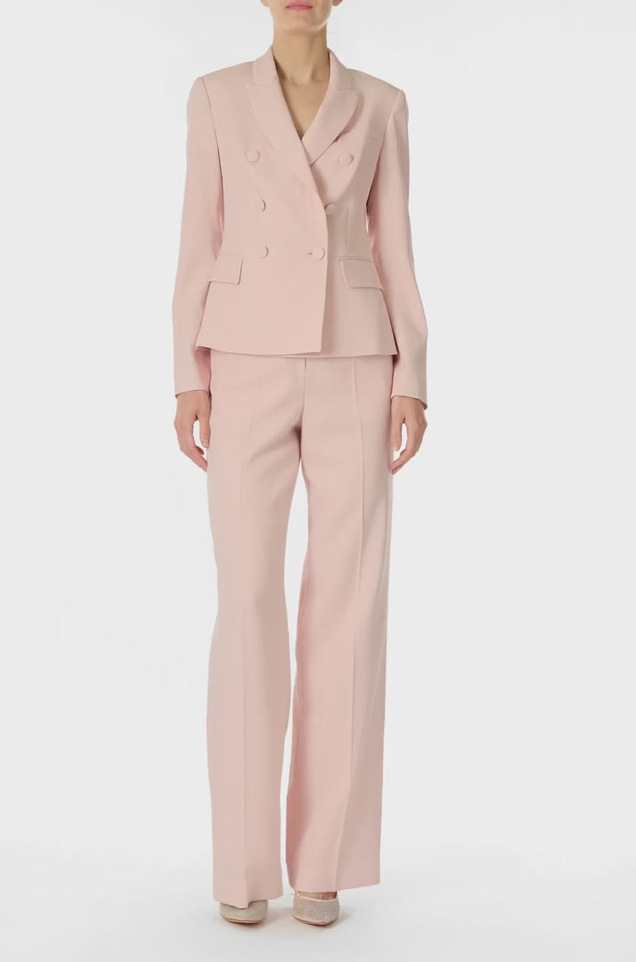 Monique Lhuillier Fall 2024 pale blush wool, double breasted wool blazer with full length sleeve - video.