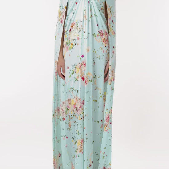 Monique Lhuillier strapless draped gown and cape in pistachio floral print fabric.