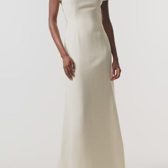 Monique Lhuillier Fall 2026 Ivory Silk Wool Suiting Pearl Trimmed Open Back Gown - video.