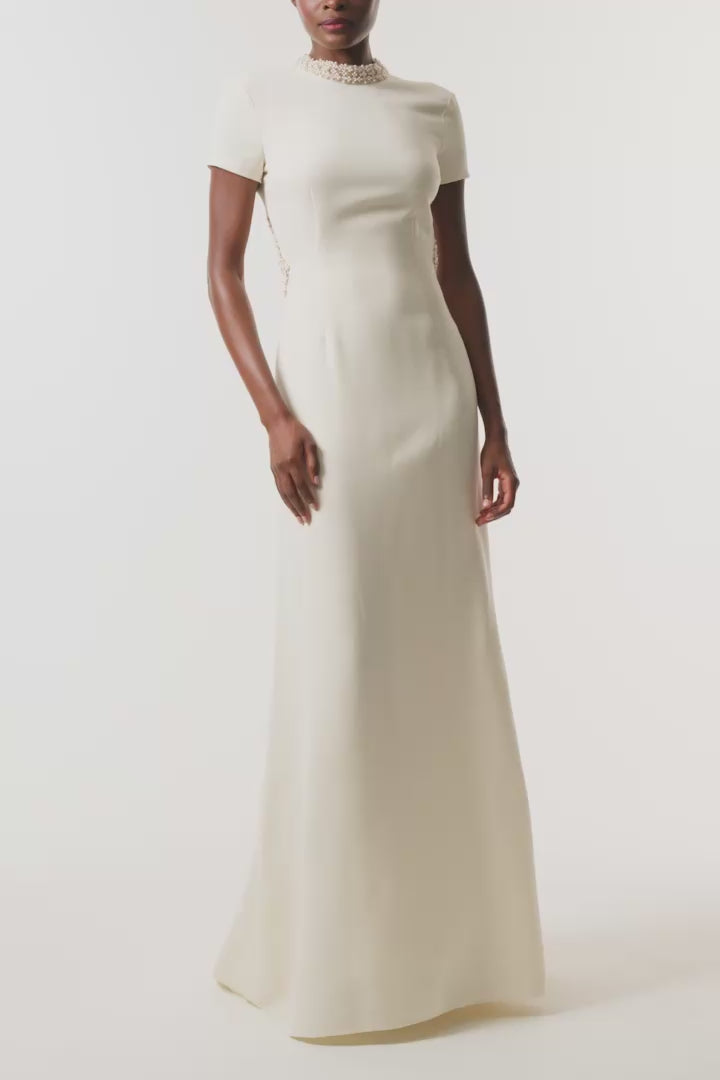 Monique Lhuillier Fall 2026 Ivory Silk Wool Suiting Pearl Trimmed Open Back Gown - video.