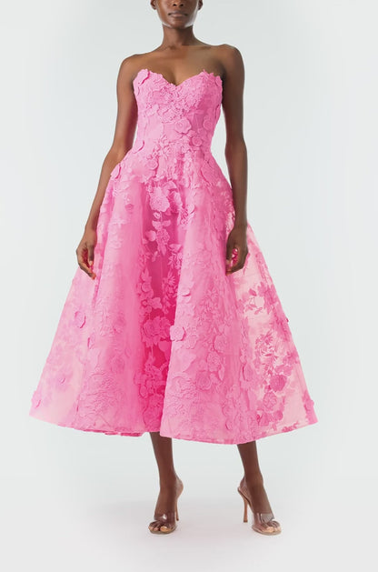 Monique Lhuillier Fall 2024 tea-length, strapless dress in pink 3D lace with full skirt and fitted sweetheart bodice - video.