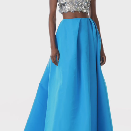 Monique Lhuillier silver embroidered crop top shown with the cobalt blue silk faille skirt.