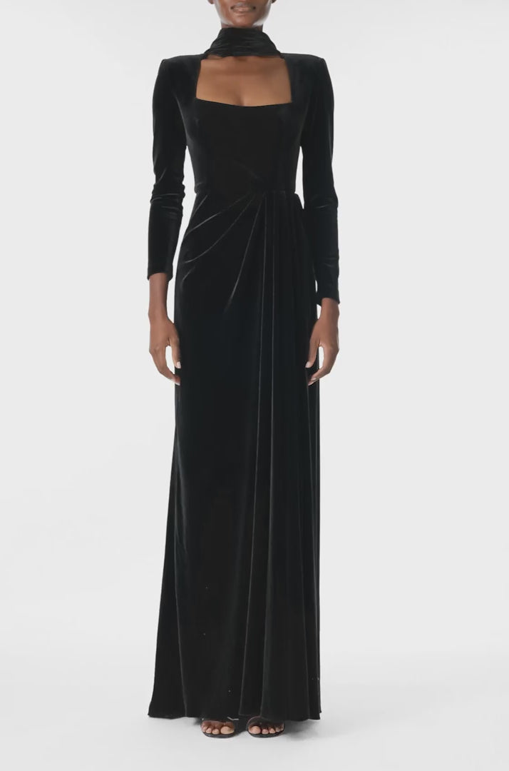 Monique Lhuillier Fall 2024 long sleeve gown with square neckline, front skirt draping and detached neck scarf in noir stretch velour - video.