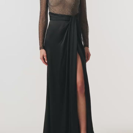 Monique Lhuillier Fall 2025 RTW Noir Long Sleeve Hotfix gown with embellished bodice and front slit - video.