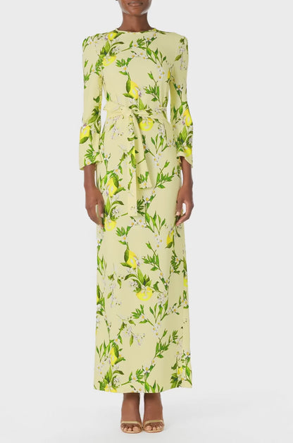 Monique Lhuillier Spring 2025 Lemon printed crepe sheath dress with jewel neckline, self-tie sash and bracelet-length long sleeves - video.