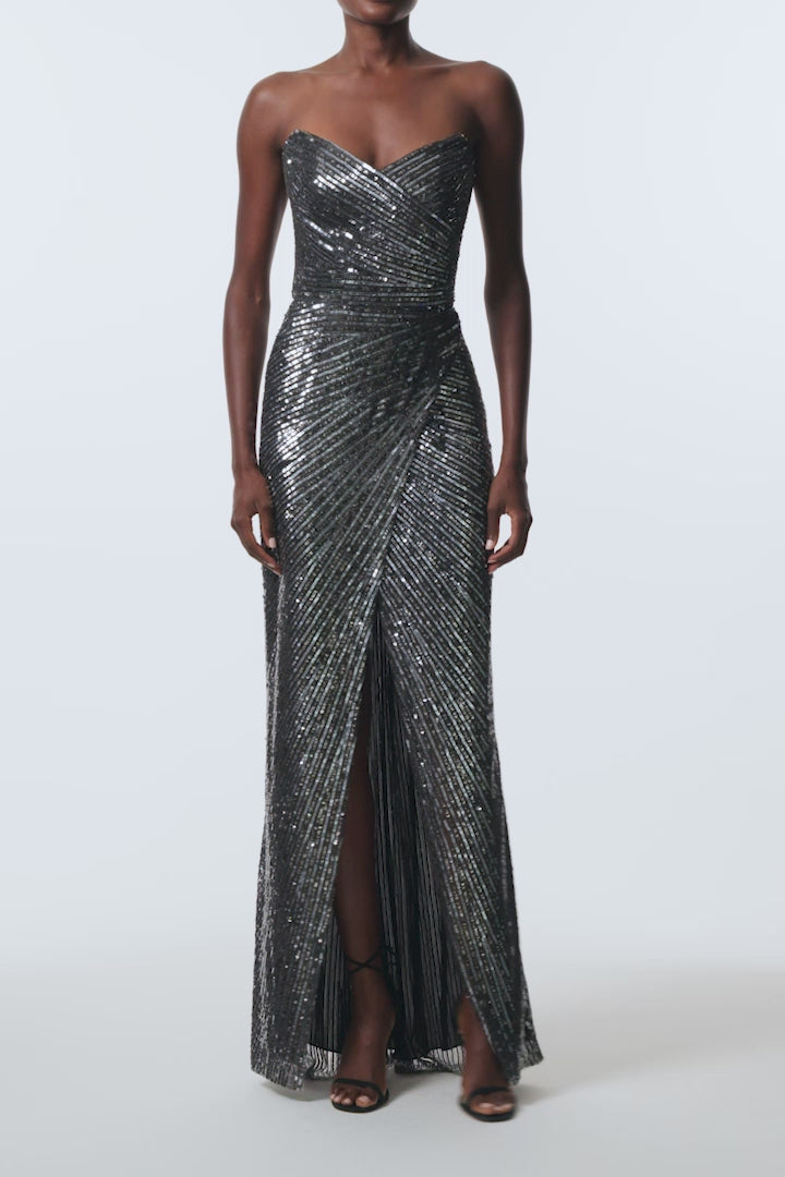 Monique Lhuillier Fall 2025 Gunmetal embroidered tulle Strapless draped column gown with high slit - video.