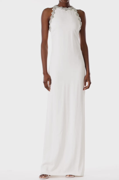 Monique Lhuillier silk white crepe gown with jewel neckline and crystal embroidery.