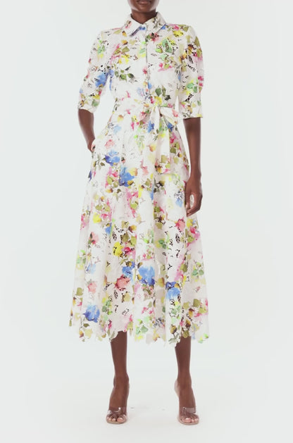 Monique Lhuillier Spring 2024 silk white floral printed lace shirt dress with pockets and a scalloped hem - video.