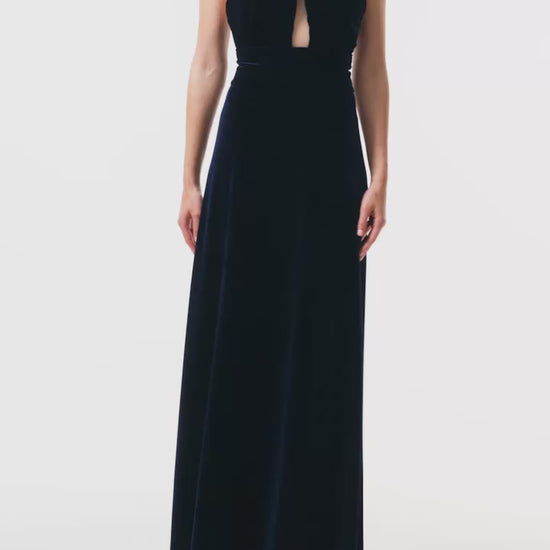 Monique Lhuillier Fall 2025 Ocean stretch velvet Twisted front halter gown with crystal ring - video.