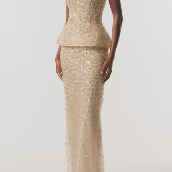 Monique Lhuillier Fall 2026 gold embroidered tulle strapless structured peplum column gown - video.