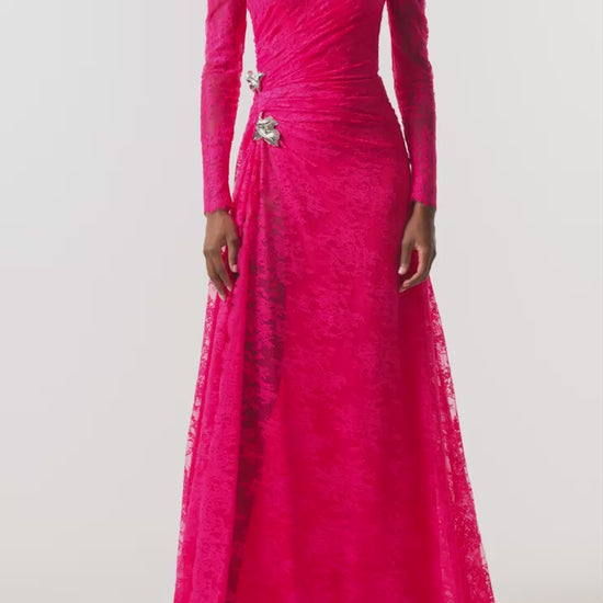Monique Lhuillier Fall 2026 Pink Chantilly Lace high neck long sleeve gown with slit and silver floral embellishment - video.