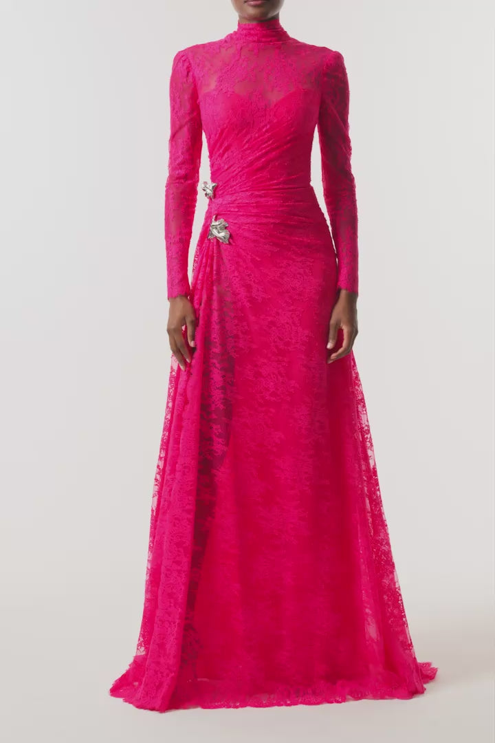 Monique Lhuillier Fall 2026 Pink Chantilly Lace high neck long sleeve gown with slit and silver floral embellishment - video.