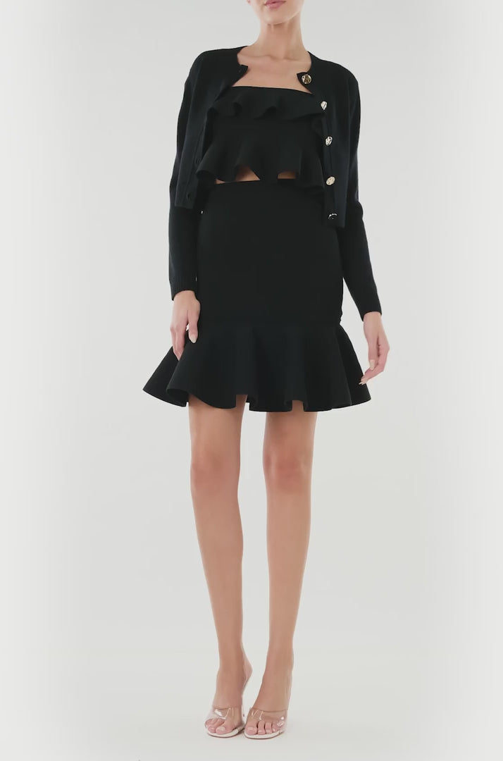 Monique Lhuillier black knit ruffle mini skirt.