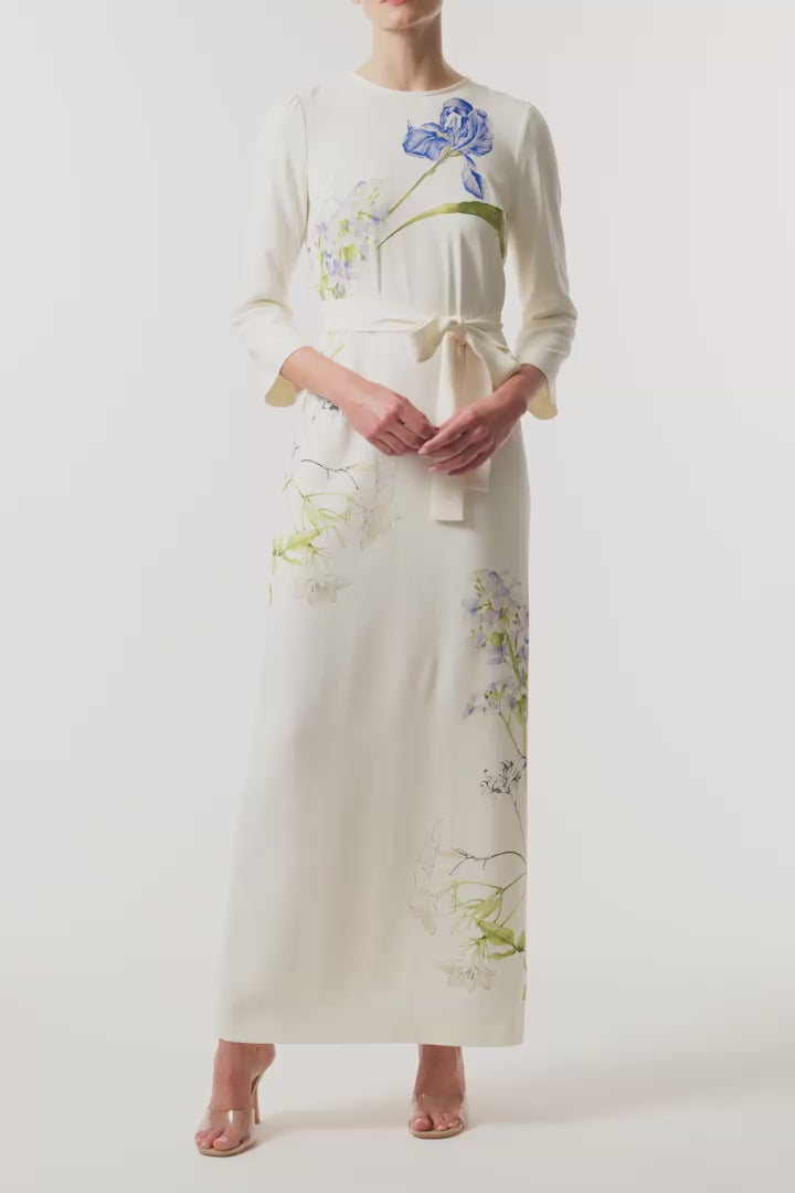 Monique Lhuillier Spring 2026 Ivory/Multi Iris Printed Crepe Bracelet sleeve sheath dress with belt - video.