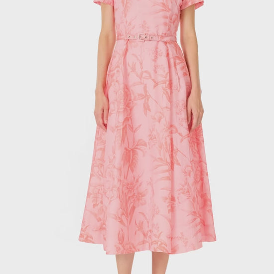 Monique Lhuillier Spring 2025 Floral printed linen dress with a-line skirt, short sleeves and pockets in Rosette Coral - video.