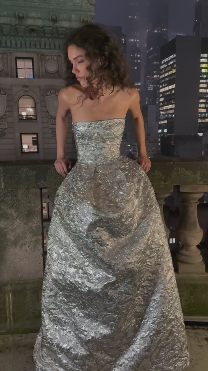 Monique Lhuillier Fall 2025 strapless silver lame rose strapless jacquard ballgown - video