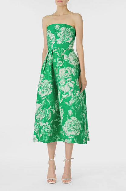 Monique Lhuillier Spring 2025 Strapless, tea-length dress with draped bodice and pockets in Grass/Silk White Floral Toile print - video.