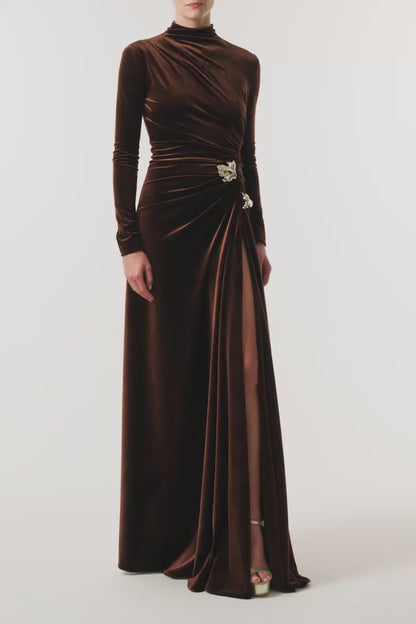 Monique Lhuillier Fall 2026 Café brown stretch velour high neck long sleeve gown with slit and gold floral embellishment - video.