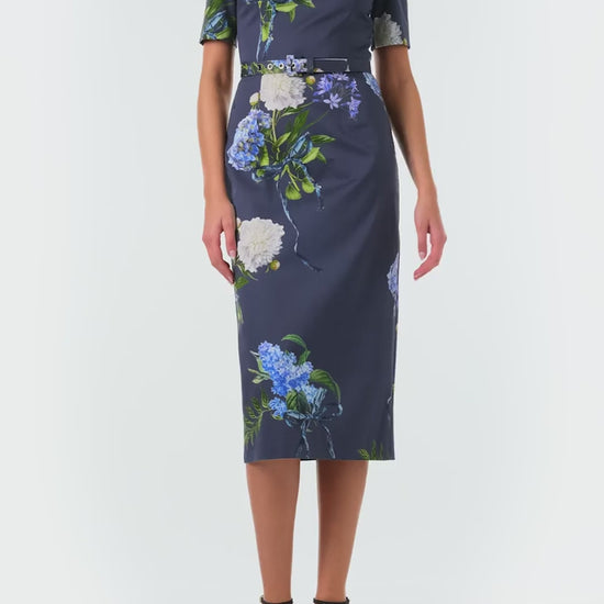 Monique Lhuillier Fall 2024 short sleeve, midi length dress with ballet neckline and belted waist - video.