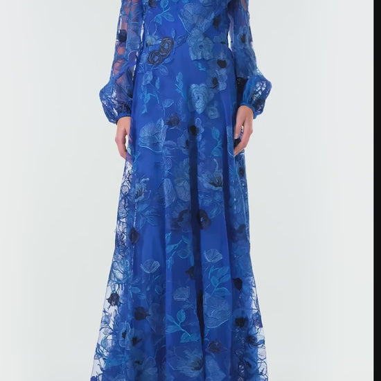 Monique Lhuilier Spring 2024 royal blue embroidered tulle long sleeve column gown with jewel neckline and detached slip lining - video.