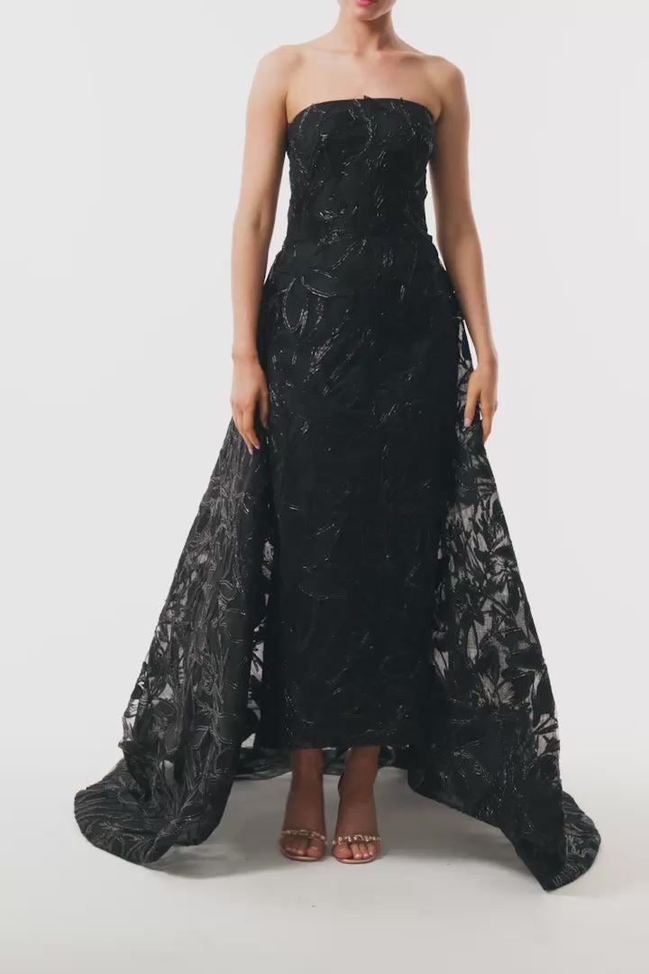 Monique Lhuillier Spring 2025 strapless gown with train in noir embroidery - video.