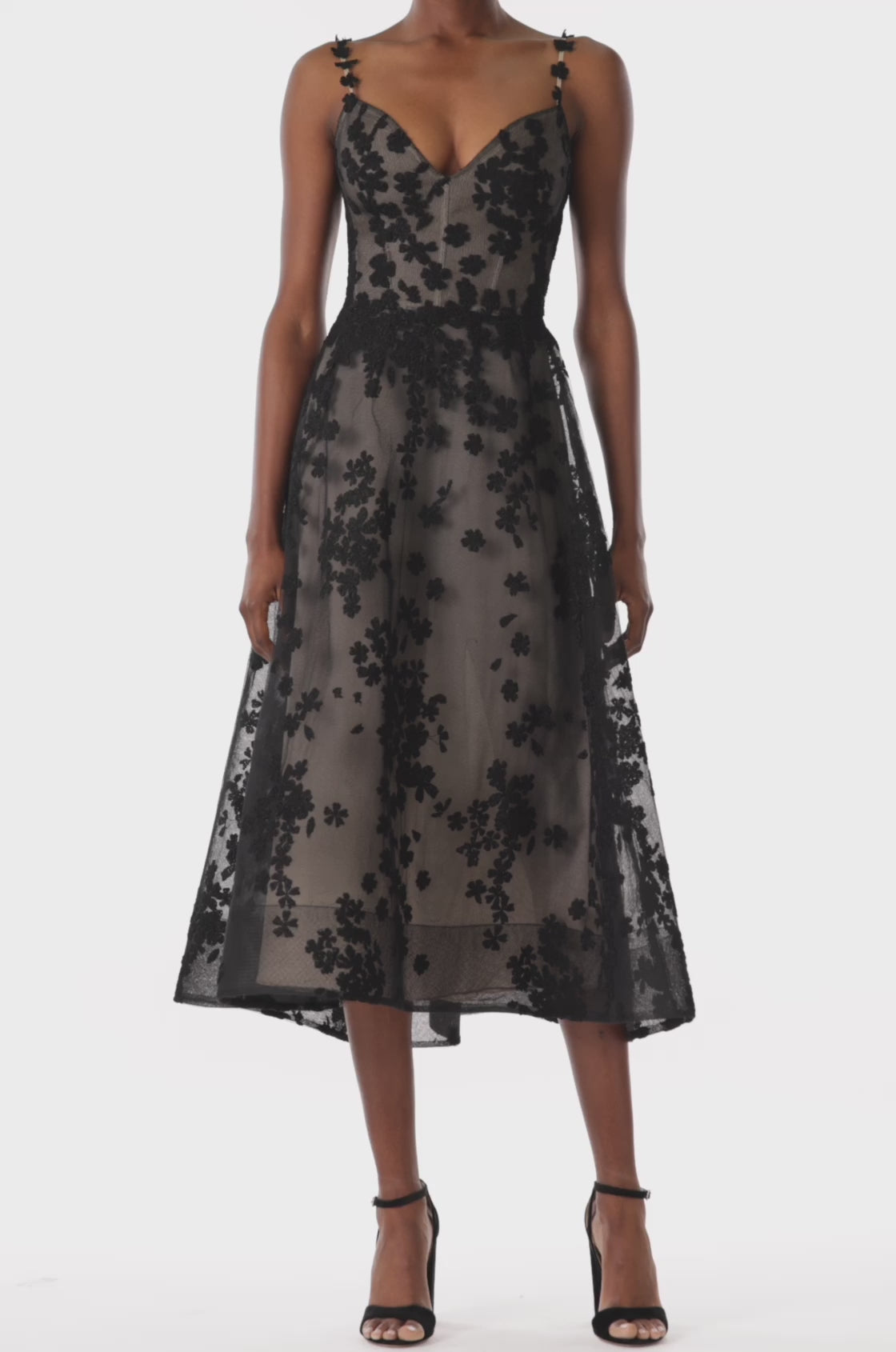Monique Lhuillier black lace and embroidered tulle aline cocktail dress with spaghetti straps.