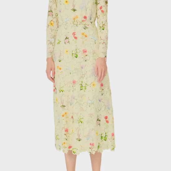 Monique Lhuillier Spring 2025 Long sleeve midi dress with jewel neckline and self-fabric belt at waist in Limoncello /Multi floral lace - video.