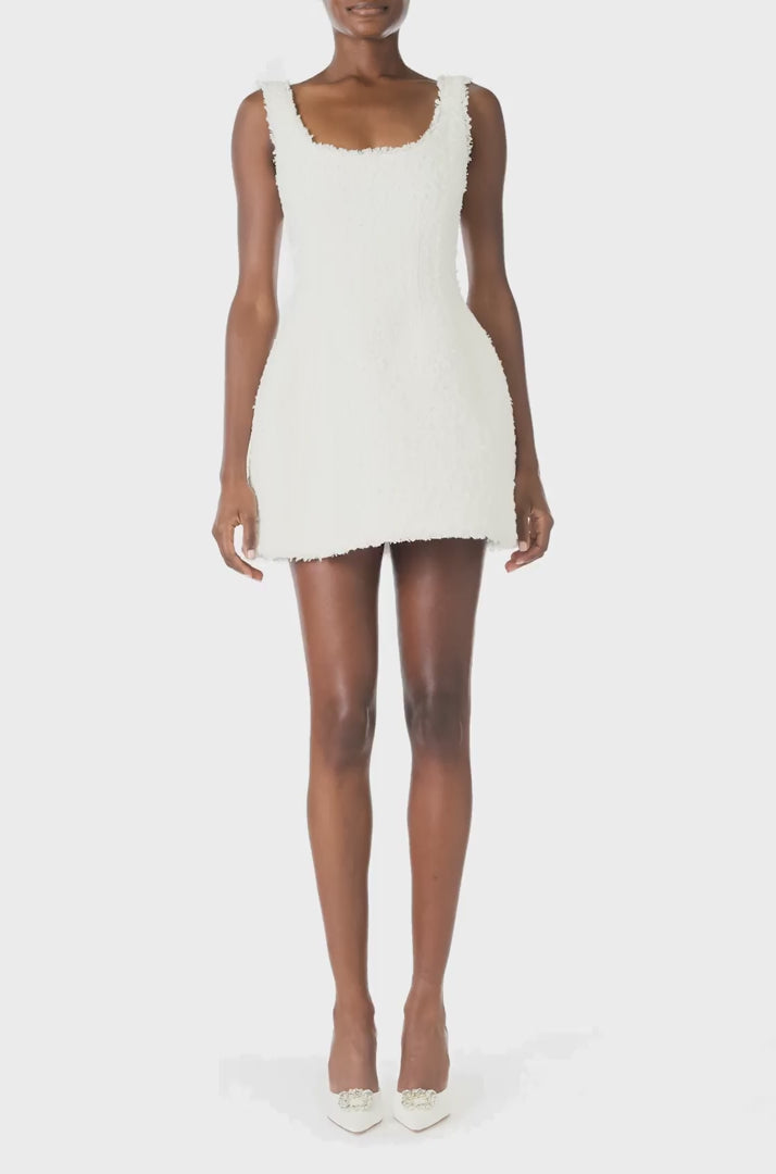 Monique Lhuillier Spring 2025 Scoop neck dress with short, sculpted skirt in Silk White Cotton Tweed - video.