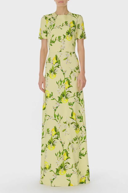 Monique Lhuillier Spring 2025 Short sleeve, floor length gown with jewel neckline in Lemon printed Crepe fabric - video.