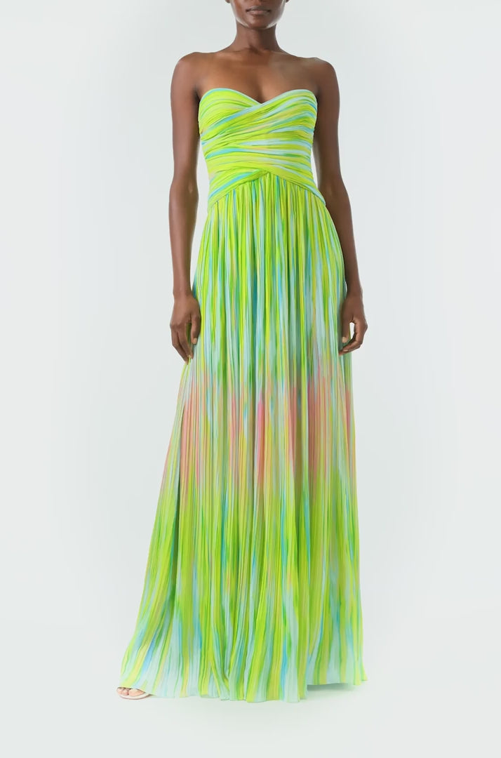 ML Monique Lhuillier Spring 2024 strapless, sweetheart neck gown with draped bodice and flowing skirt in green Electric Stripe pleated crinkle chiffon - video.