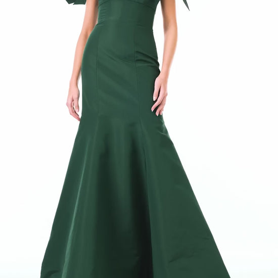 Monique Lhuillier Fall 2024 off the shoulder gown with trumpet skirt and bow sleeves in Juniper green faille fabric - video.