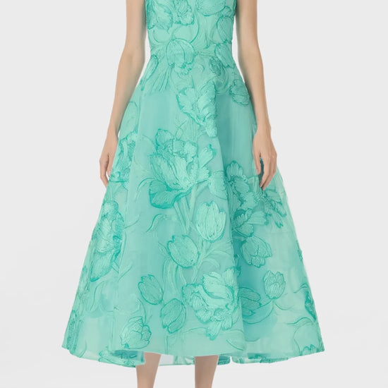 Monique Lhuillier strapless, tea-length dress with corseted sweetheart bodice and structured skirt in Aqua embroidered floral tulle - video.