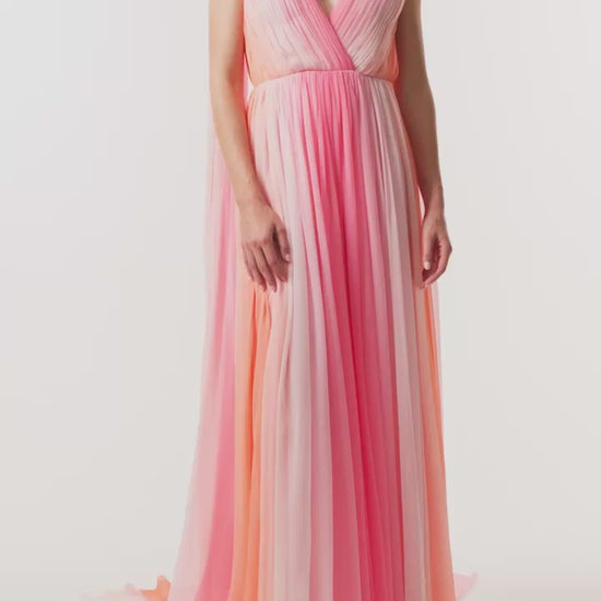 Monique Lhuillier Spring 2026 Plumeria ombre chiffon pleated v-neck gown with streamers - video.