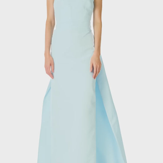 Monique Lhuillier Spring 2025 Strapless, draped column gown with attached train in Powder Blue faille fabric - video.