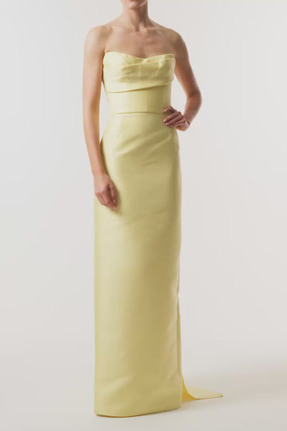 Monique Lhuillier Fall 2026 Pale yellow Mikado Piqué strapless column gown with train - video.