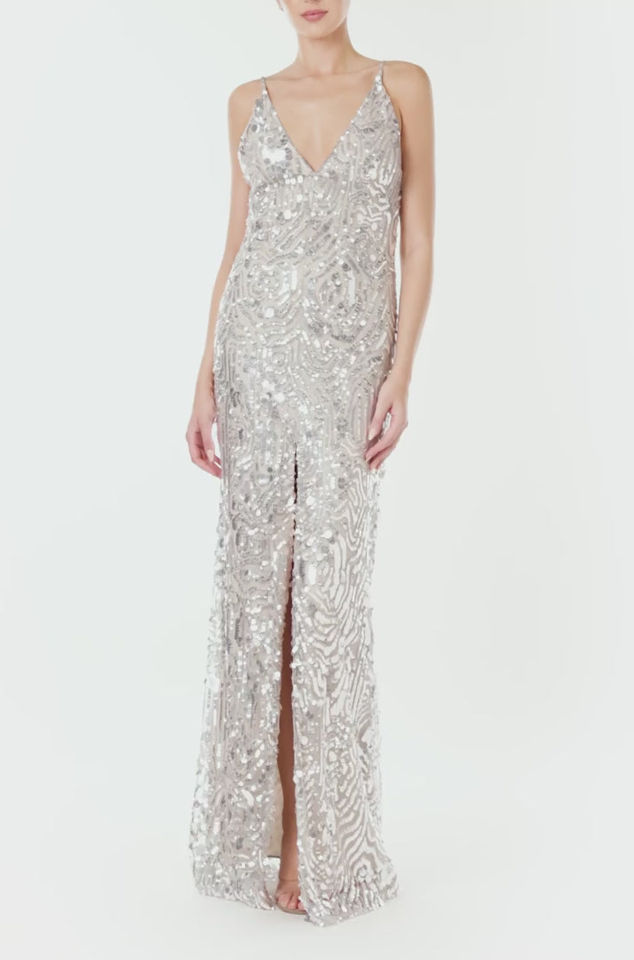 Monique Lhuillier Spring 2024 silver sequin slip gown with deep v neckline and high front slit - video.