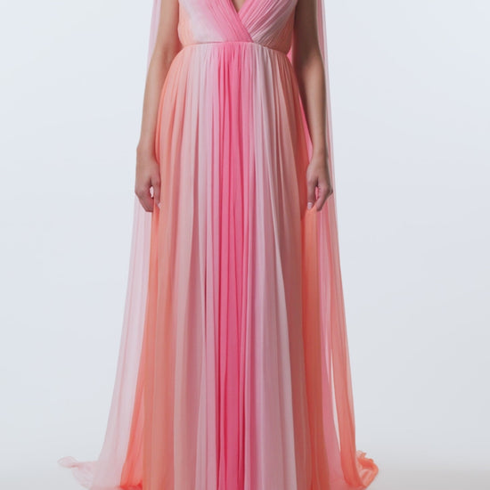 Monique Lhuillier Spring 2026 Plumeria ombre chiffon pleated v-neck gown with streamers - video.