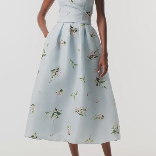 Monique Lhuillier Fall 2026 Breeze Multi Floating Posies Printed Gazar Strapless tea length dress - video.