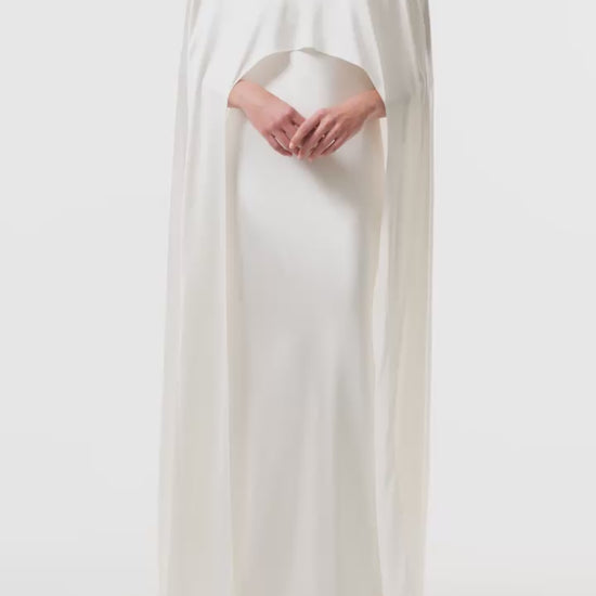 Silk white satin "Viola" cape with long back train and rounded front.  Shown over the Viola silk white satin floor length gown - video.