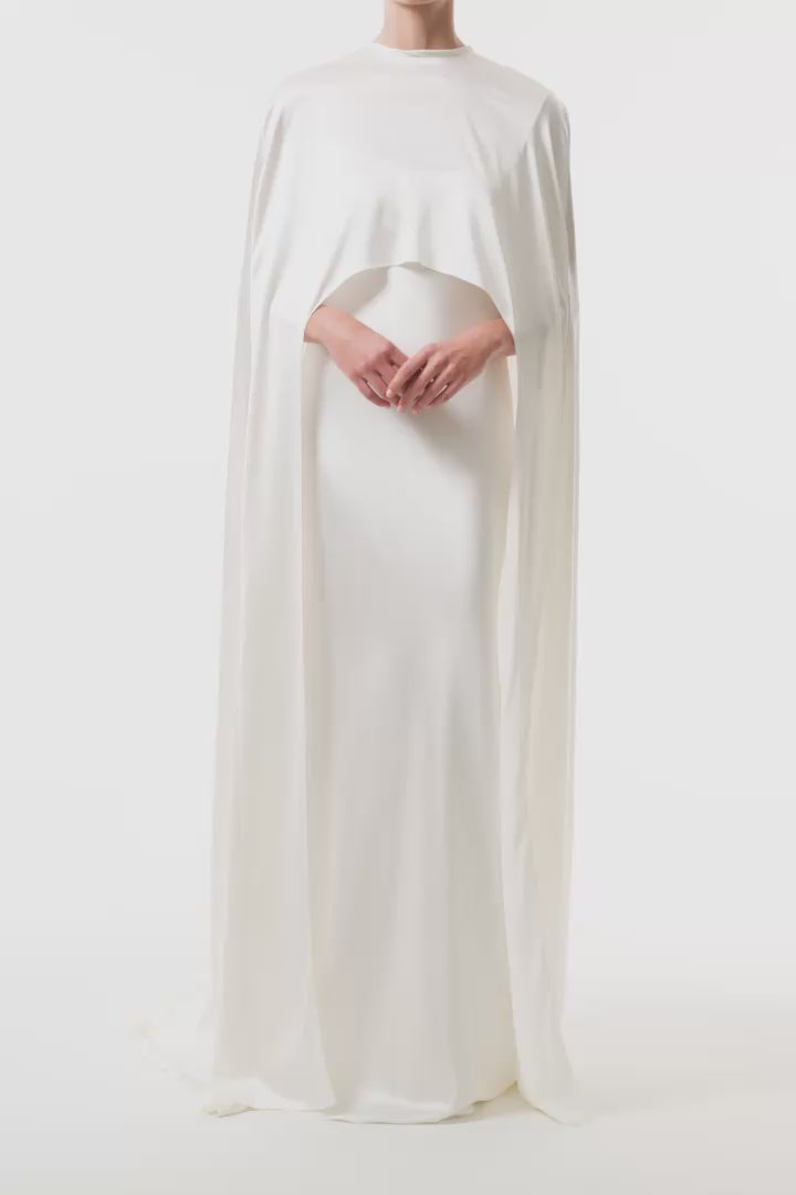 Silk white satin "Viola" cape with long back train and rounded front.  Shown over the Viola silk white satin floor length gown - video.